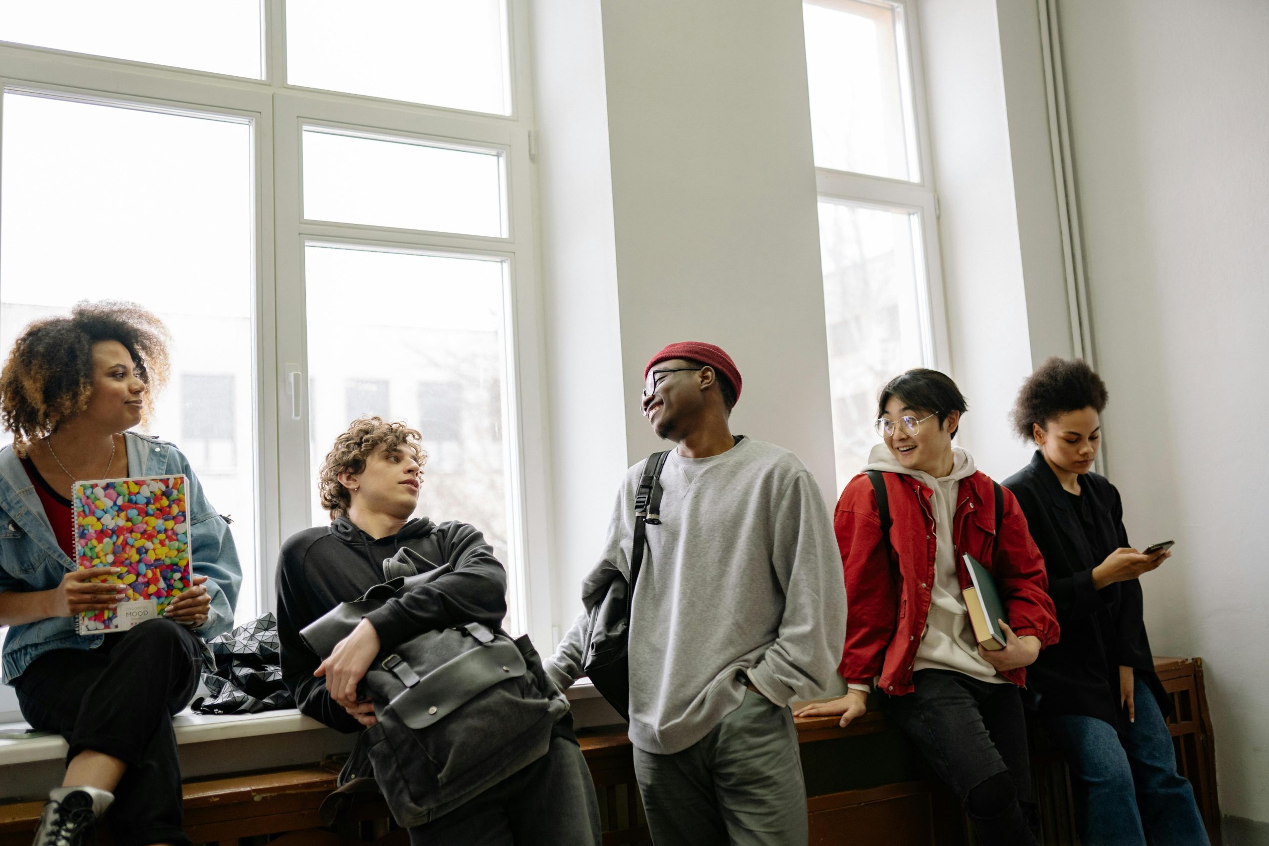 Group of university students on campus chatting